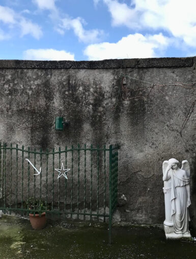 Baffled angel in Naples, Italy